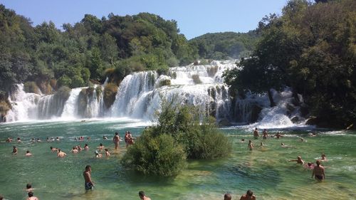 People in river at krka national park