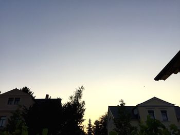 Low angle view of buildings against clear sky