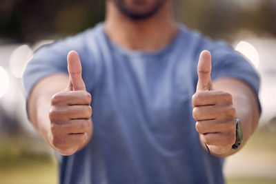 Midsection of woman holding hands