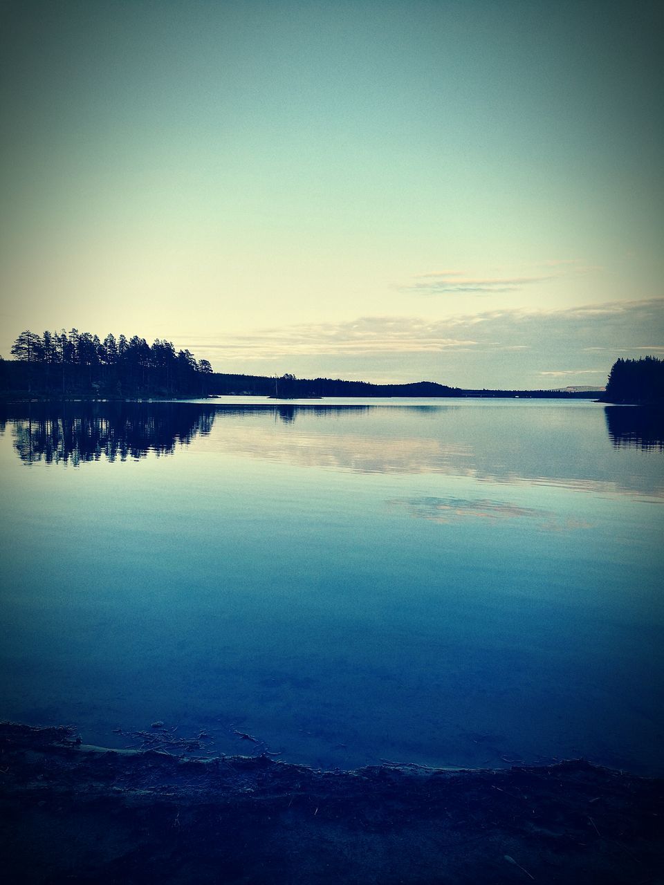 water, tranquil scene, tranquility, scenics, reflection, lake, beauty in nature, sky, calm, blue, nature, waterfront, standing water, non-urban scene, sea, no people, remote, water surface, ocean, majestic