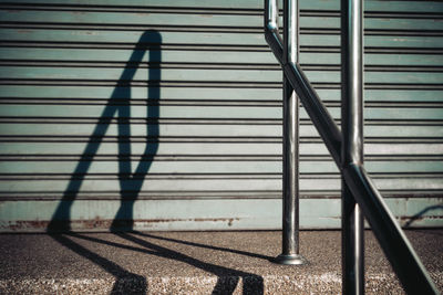 High angle view of metal railing against wall