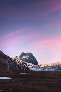 Scenic view of mountains against sky during winter