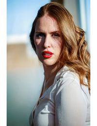 Portrait of young woman looking away