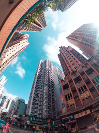 Low angle view of modern buildings against sky in city