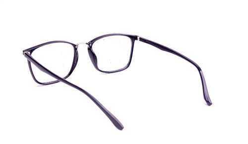 Close-up of eyeglasses against white background