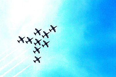 Low angle view of airplane flying in sky