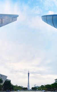 Low angle view of monument against cloudy sky