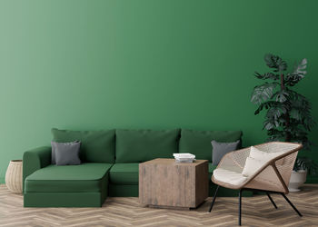 Empty green wall in modern living room. mock up interior in contemporary style. free space