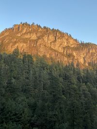 Scenic view of rocky mountains against clear sky