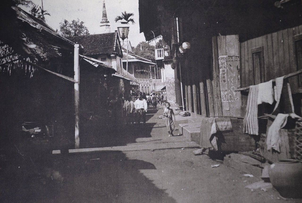 VIEW OF STREET AMIDST BUILDINGS