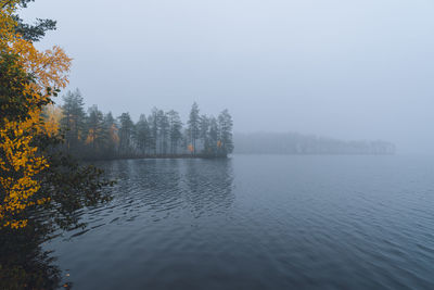Scenic view of lake against sky during autumn