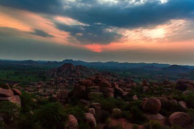 Scenic view of landscape against sky during sunset