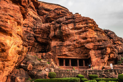 Temple on the shores of lake with mountain in background