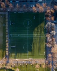 View of soccer field against buildings