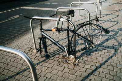 High angle view of bicycle on footpath