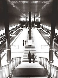 Man walking on footbridge