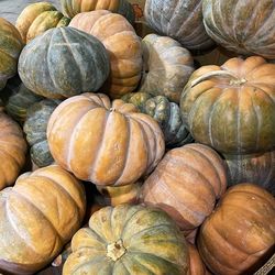 Full frame shot of pumpkins at market stall