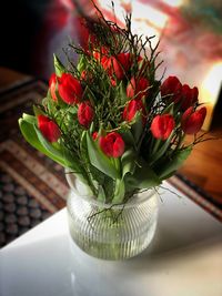 Close-up of red flower pot on table