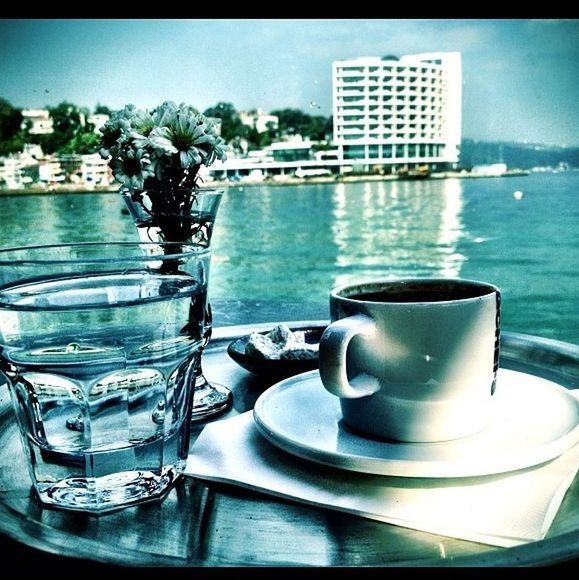 drink, refreshment, table, food and drink, water, freshness, blue, drinking glass, coffee cup, still life, saucer, glass - material, reflection, close-up, cup, no people, indoors, coffee - drink, coffee, sky