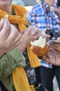 Close-up of man holding ice cream