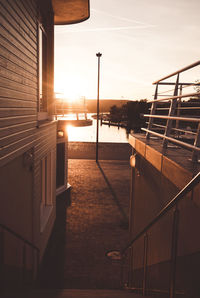 View of swimming pool at sunset