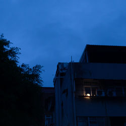 Low angle view of building against sky at night