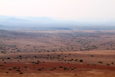 Scenic view of desert against sky