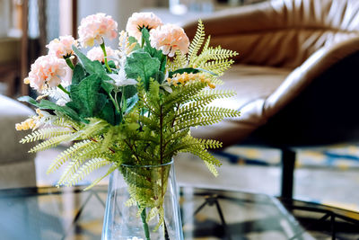 Close-up of flower vase on table