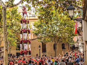 People forming pyramid during traditional festival