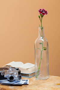 Close-up of flower in jar on table