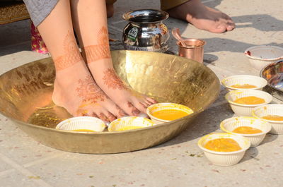 Midsection of woman preparing food