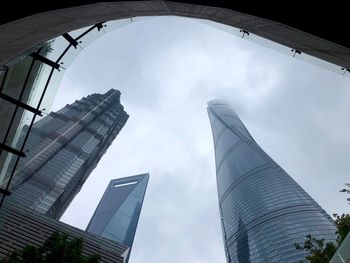 Low angle view of modern buildings against sky