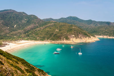 High angle view of sailboats in bay