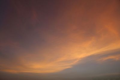 Low angle view of dramatic sky during sunset