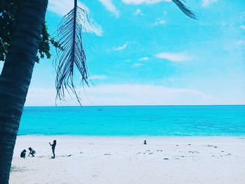 Scenic view of sea against blue sky