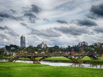 View of city against cloudy sky