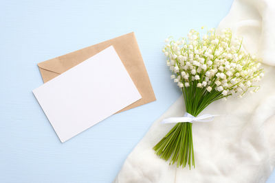 High angle view of white flower vase on table