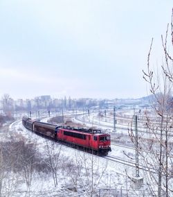 Train on snow covered railroad track