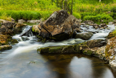 Stream flowing through rocks