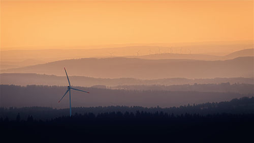 Scenic view of silhouette landscape against sky during sunset