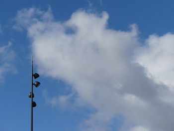 Low angle view of street light against sky