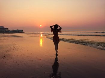 Scenic view of sea at sunset