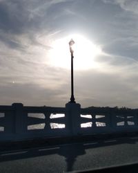 Street light against sky during sunset