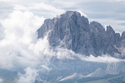 Dolomites mountains engulfed in clouds 