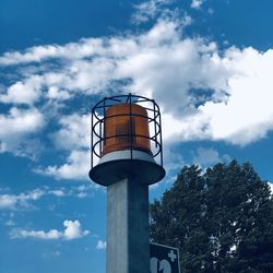 Low angle view of water tower against sky