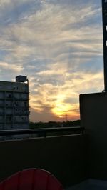 View of city against sky during sunset