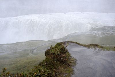 Close-up of water flowing in winter landscape