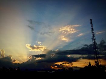 Low angle view of silhouette landscape against sky during sunset