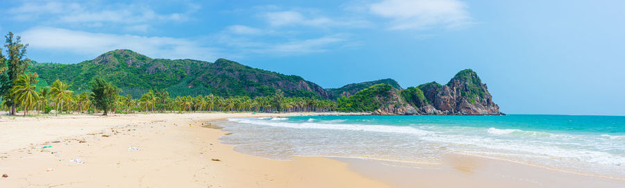 Scenic view of beach against sky