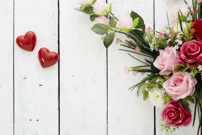 Directly above shot of red roses on table